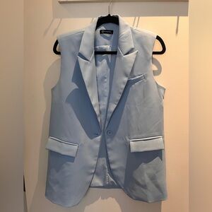 Pretty Garden oversized baby blue vest
Size small